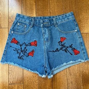Rose embroidered denim shorts